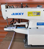 Juki Industrial Button Stitch Machine is a high-speed, precision sewing machine designed for attaching buttons securely in garment manufacturing.