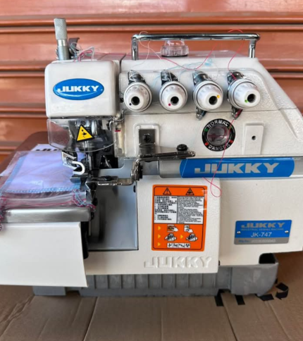 The Juki Industrial Overlock Machine is a high-performance sewing machine designed for finishing edges, hemming, and overlocking in garment manufacturing and other industrial sewing applications.